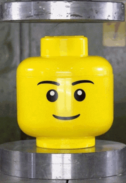 overcoming imposter syndrome and unsquashing yourself - lego man being squashed