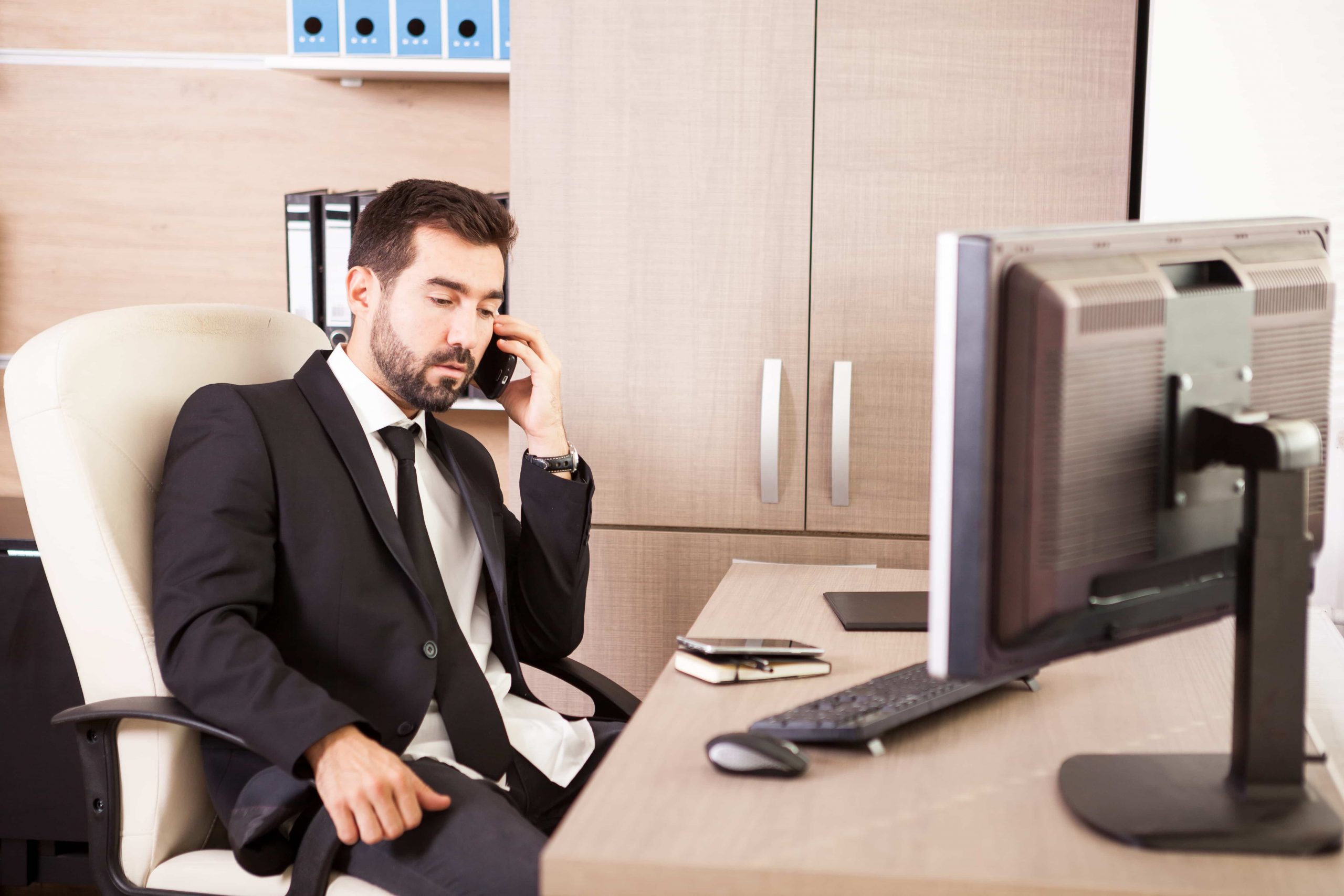 A businessman on a business call with a business coach or a business co-pilot